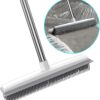Rubber broom brush with built-in squeegee, designed for removing pet hair from carpets, rugs, and hard floors. Features electrostatic rubber bristles for effective hair pickup and easy cleaning